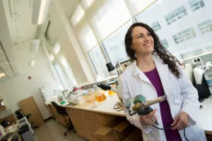 Deborah Fuller, PhD, a professor in UW Medicine’s Department of Microbiology, in her lab.