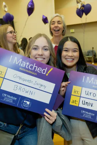UW School of Medicine students posing with their "I Matched!" signs on Match Day 2023.