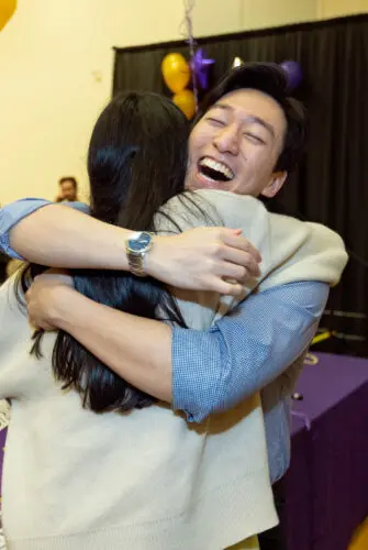 A medical student hugs their loved one on Match Day 2023.
