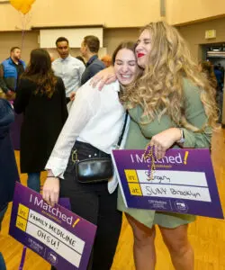 Medical students hugging on Match Day 2023