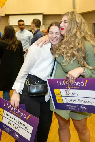 Medical students hugging on Match Day 2023
