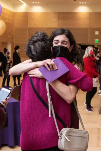 A medical student hugs their loved one on Match Day 2023.