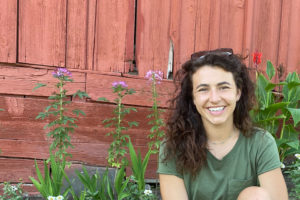 Christina Gibbs, UW School of Medicine student, in a garden