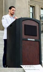Devin reading "Pre-Existing Condition", an essay he wrote following George Floyd's murder, at the White Coats for Black Lives rally in Boise, Idaho during the summer of 2020.