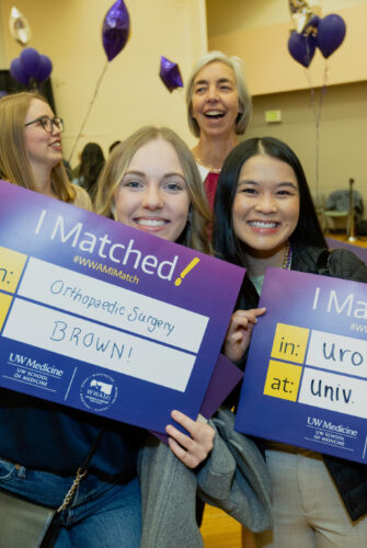 UW School of Medicine students posing with their "I Matched!" signs on Match Day 2023.