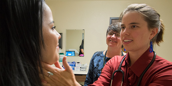 A UW Medicine trainee treating a patient. One-third of the physicians at UW Medicine are residents or fellows.