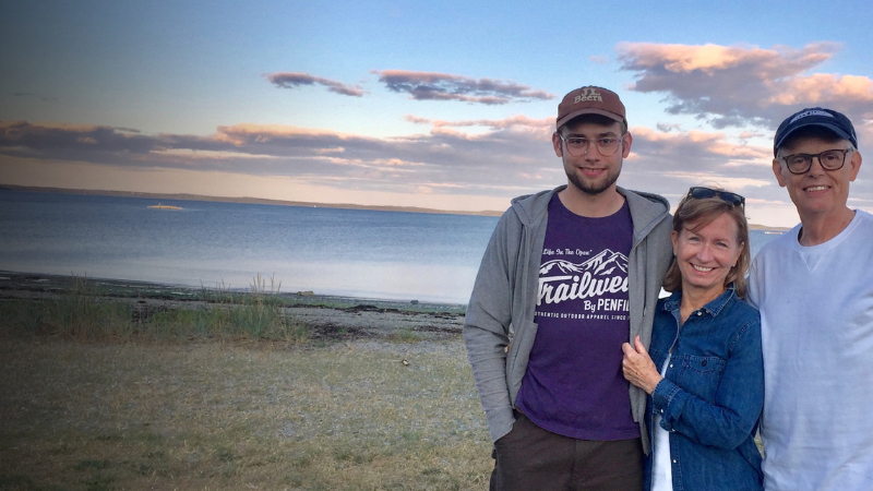 Matt Dahl with his parents at the beach