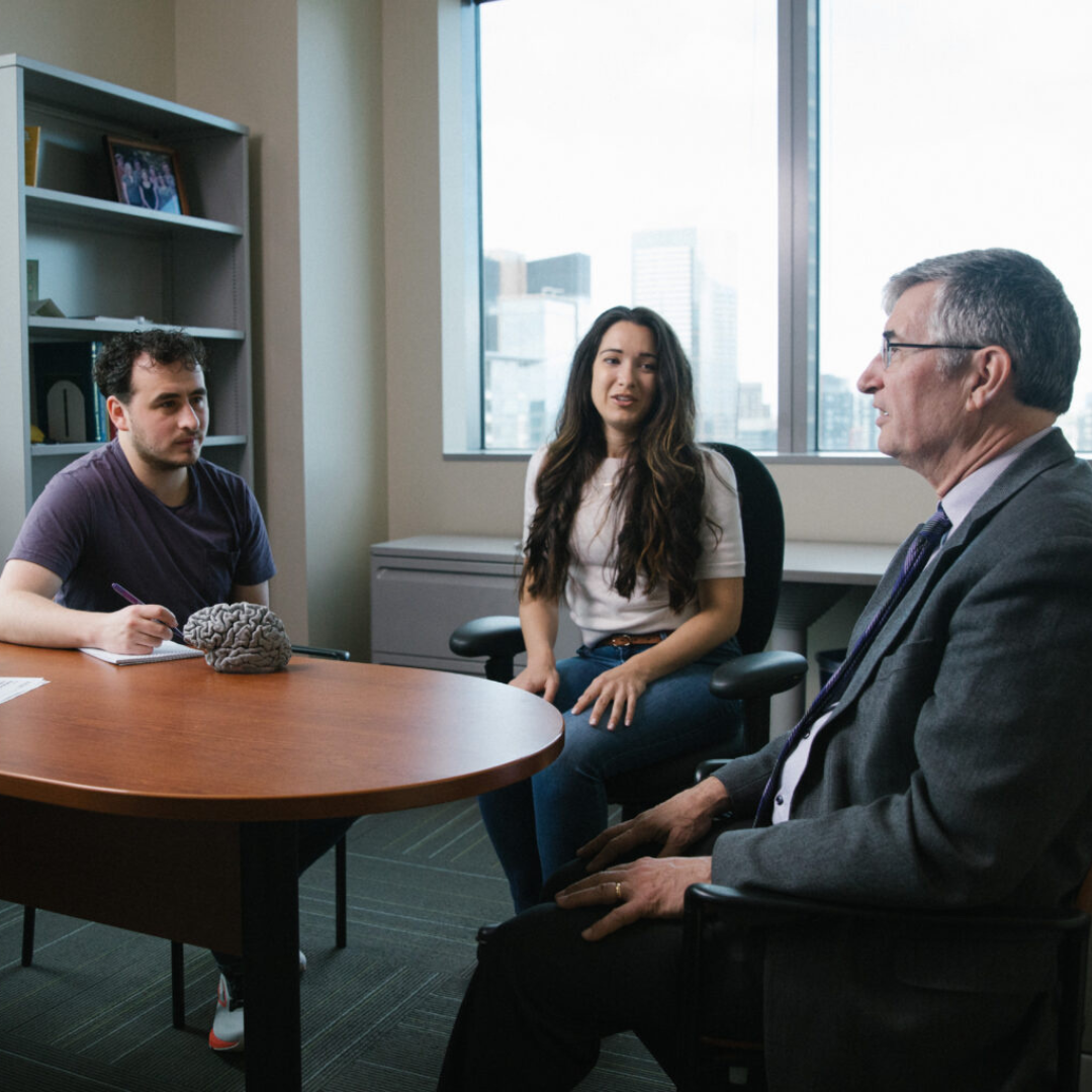 Dr. Grabowski speaking to colleagues at the Alzheimer's Disease Research Center (ADRC).