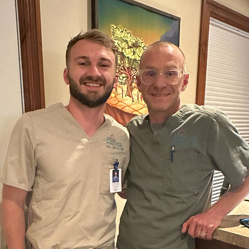 Caleb Allred with his father, John Allred